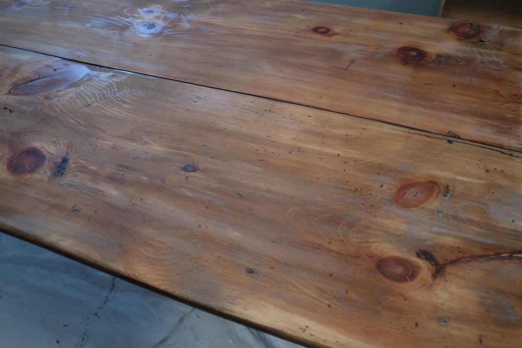 Antique harvest table after one coat of stain