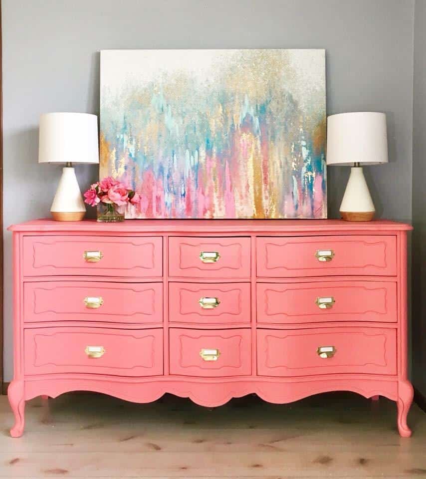 Coral painted French Provincial dresser. Bold color painted furniture.